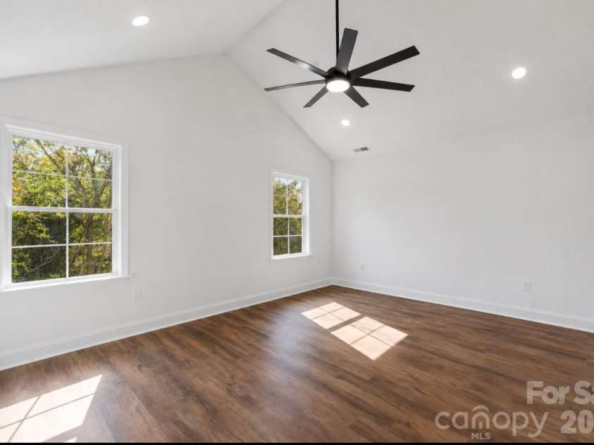 394 NC HWY 200 None, Stanfield, NC 28163.  MLS# CAR4378904, YatesRealty ID 24228. *representative photo- primary bedroom w/ vaulted ceiling