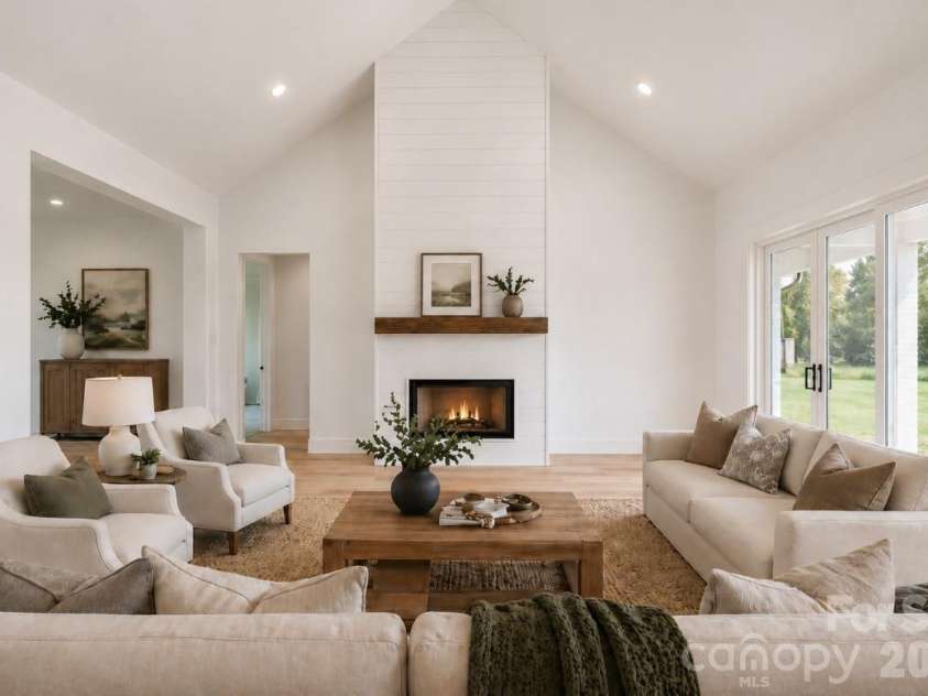 394 NC HWY 200 None, Stanfield, NC 28163.  MLS# CAR4378904, YatesRealty ID 24228. *representative photo- staged living room w/ optional vaulted ceiling