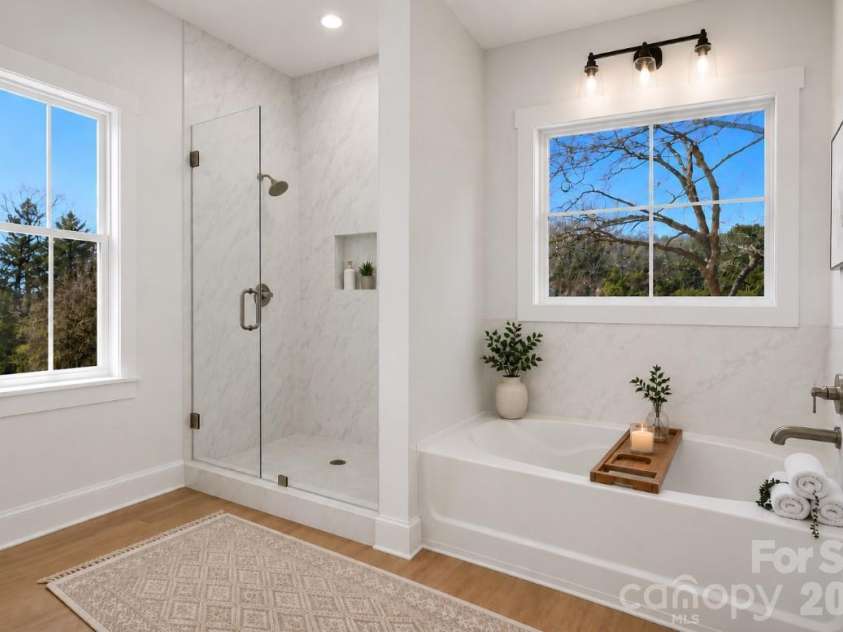 394 NC HWY 200 None, Stanfield, NC 28163.  MLS# CAR4378904, YatesRealty ID 24228. *representative photo- staged primary bathroom