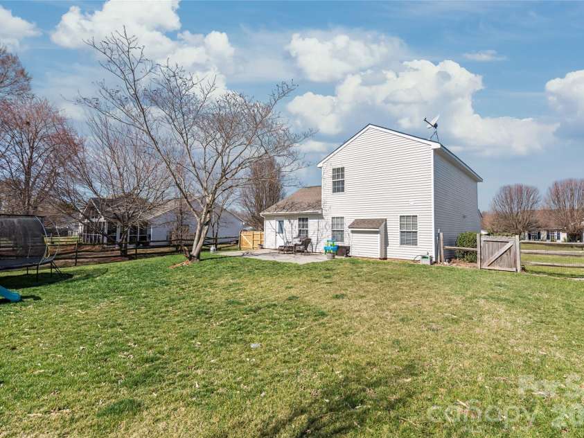 3085 Counselors Drive, Monroe, NC 28110.  MLS# CAR4349850, YatesRealty ID 2423. Beautiful Fenced Backyard