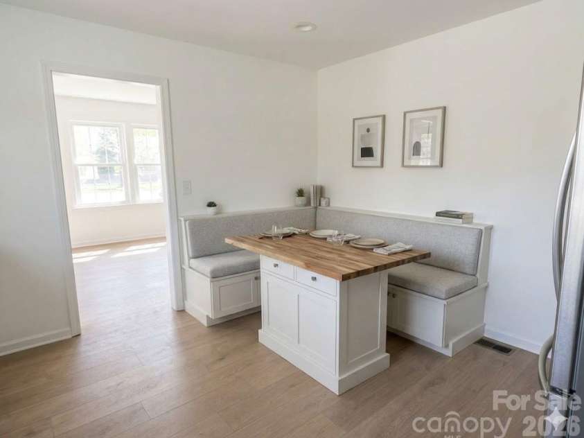 4946 Morgan Street, Charlotte, NC 28208.  MLS# CAR4361415, YatesRealty ID 24232. AI Generated Photo idea for built in kitchen table with storage! 