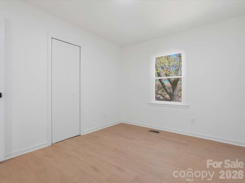 4946 Morgan Street, Charlotte, NC 28208.  MLS# CAR4361415, YatesRealty ID 24232. Bedroom or flex room next to the kitchen 