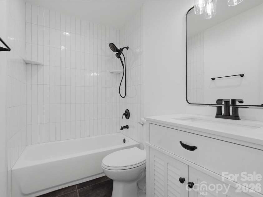 4946 Morgan Street, Charlotte, NC 28208.  MLS# CAR4361415, YatesRealty ID 24232. Gorgeous tile floors and tiled shower