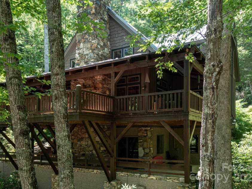 151 Sanctuary Drive, Burnsville, NC 28714.  MLS# CAR4276190, YatesRealty ID 24235. Wrap-Around Deck and Patio