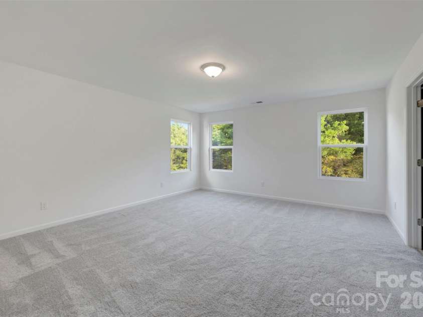 1317 Fremont Drive, Wingate, NC 28174.  MLS# CAR4368117, YatesRealty ID 24236. Owner's suite