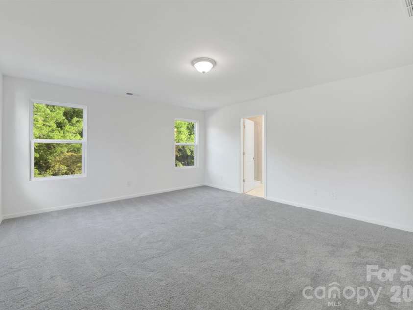 1317 Fremont Drive, Wingate, NC 28174.  MLS# CAR4368117, YatesRealty ID 24236. Owner's suite