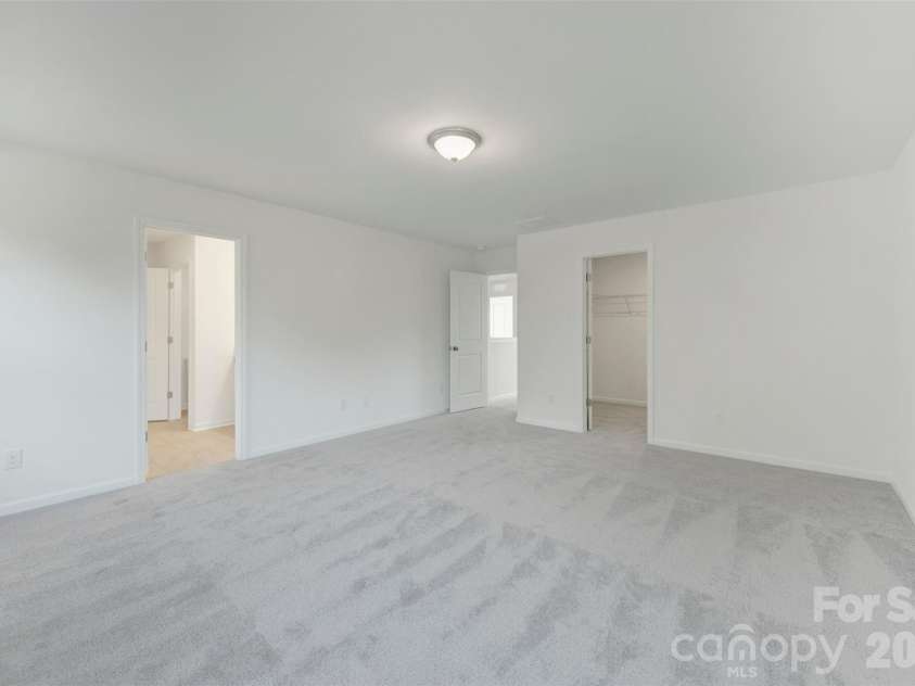 1317 Fremont Drive, Wingate, NC 28174.  MLS# CAR4368117, YatesRealty ID 24236. Owner's suite