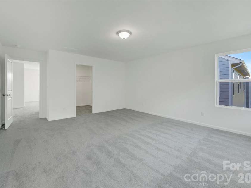 1317 Fremont Drive, Wingate, NC 28174.  MLS# CAR4368117, YatesRealty ID 24236. Owner's suite
