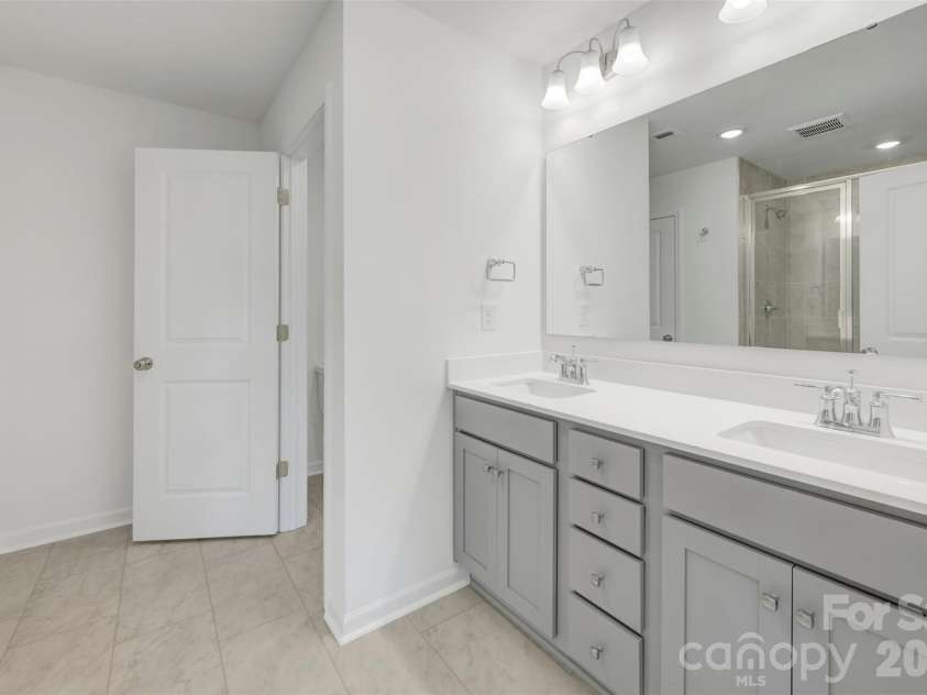 1317 Fremont Drive, Wingate, NC 28174.  MLS# CAR4368117, YatesRealty ID 24236. Owner's suite