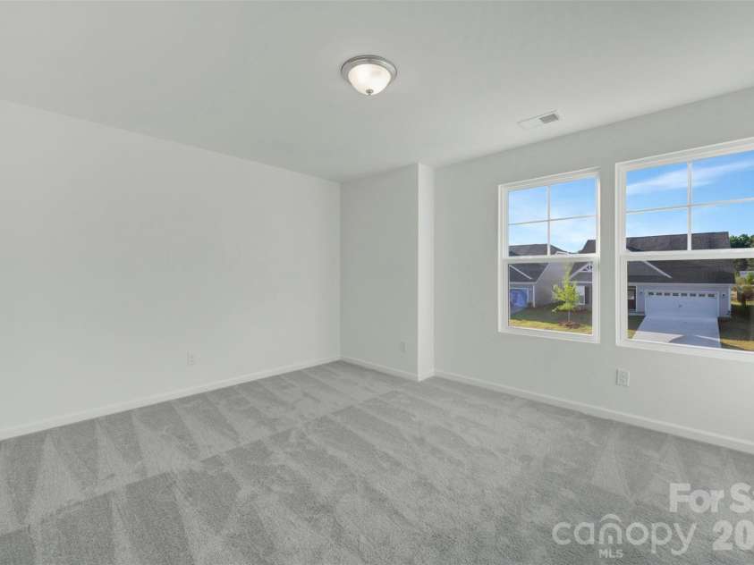 1317 Fremont Drive, Wingate, NC 28174.  MLS# CAR4368117, YatesRealty ID 24236. Secondary bedroom