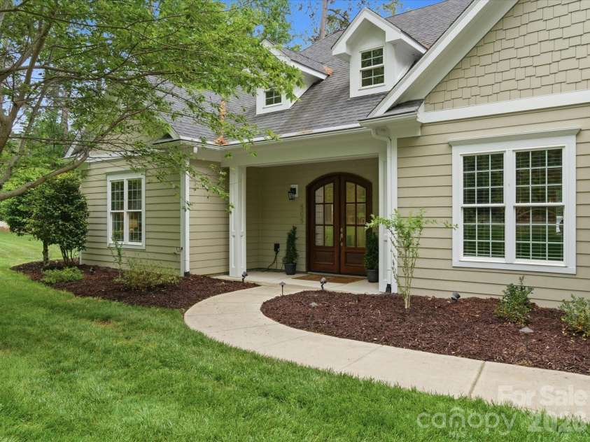 505 Stonemarker Road, Mooresville, NC 28117.  MLS# CAR4373909, YatesRealty ID 24238. Quaint covered porch.