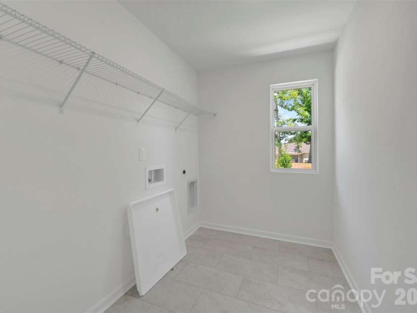 1841 Augustine Street, Monroe, NC 28112.  MLS# CAR4380852, YatesRealty ID 24239. Laundry room