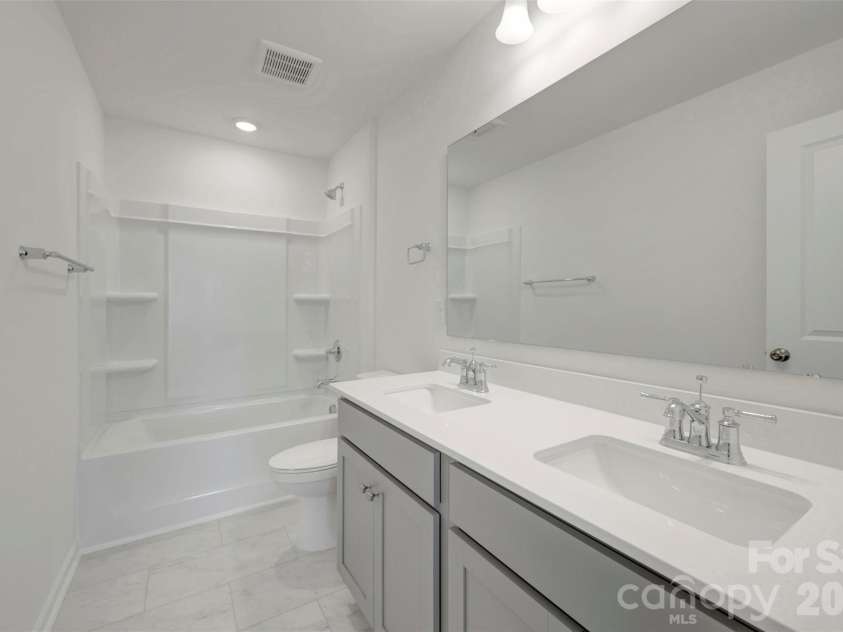1841 Augustine Street, Monroe, NC 28112.  MLS# CAR4380852, YatesRealty ID 24239. Secondary bathroom