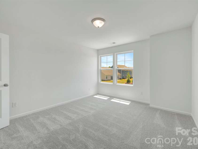 1841 Augustine Street, Monroe, NC 28112.  MLS# CAR4380852, YatesRealty ID 24239. Secondary bedroom