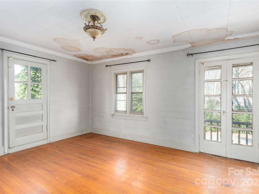 202 Alexander Avenue, Swannanoa, NC 28778.  MLS# CAR4234591, YatesRealty ID 2424. 3rd bedroom upstairs with roof patio access