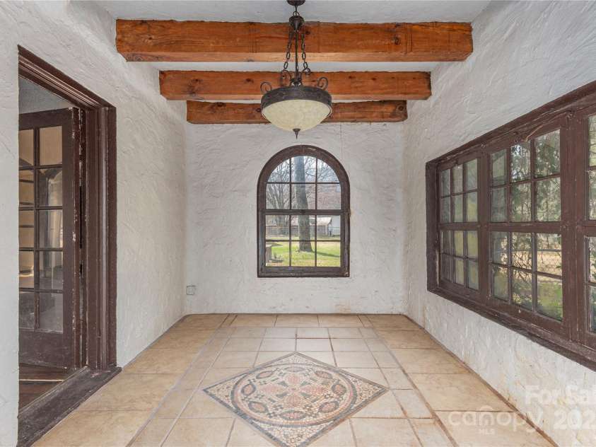 202 Alexander Avenue, Swannanoa, NC 28778.  MLS# CAR4234591, YatesRealty ID 2424. Original exposed beams and flooring.