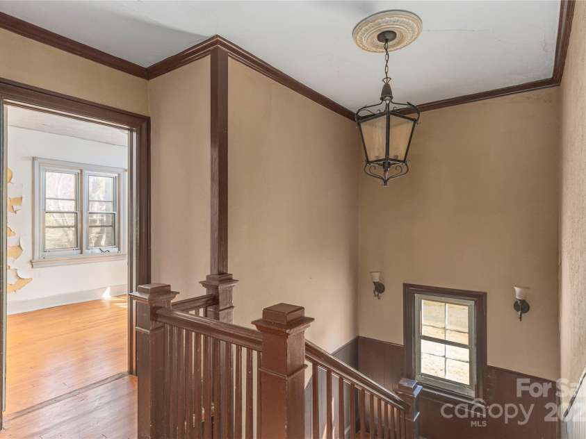 202 Alexander Avenue, Swannanoa, NC 28778.  MLS# CAR4234591, YatesRealty ID 2424. Original fixtures and staircase