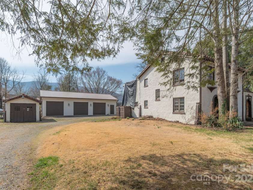 202 Alexander Avenue, Swannanoa, NC 28778.  MLS# CAR4234591, YatesRealty ID 2424. Small garage and added 3 car heated garage