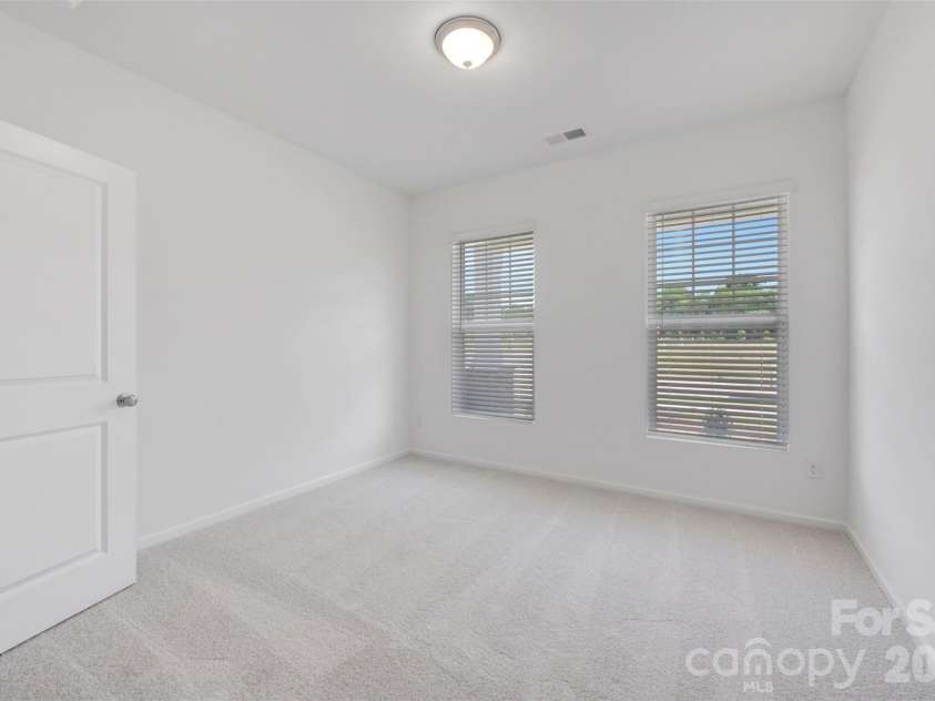645 Willoughby Park Drive, Monroe, NC 28112.  MLS# CAR4376577, YatesRealty ID 24240. First floor bedroom
