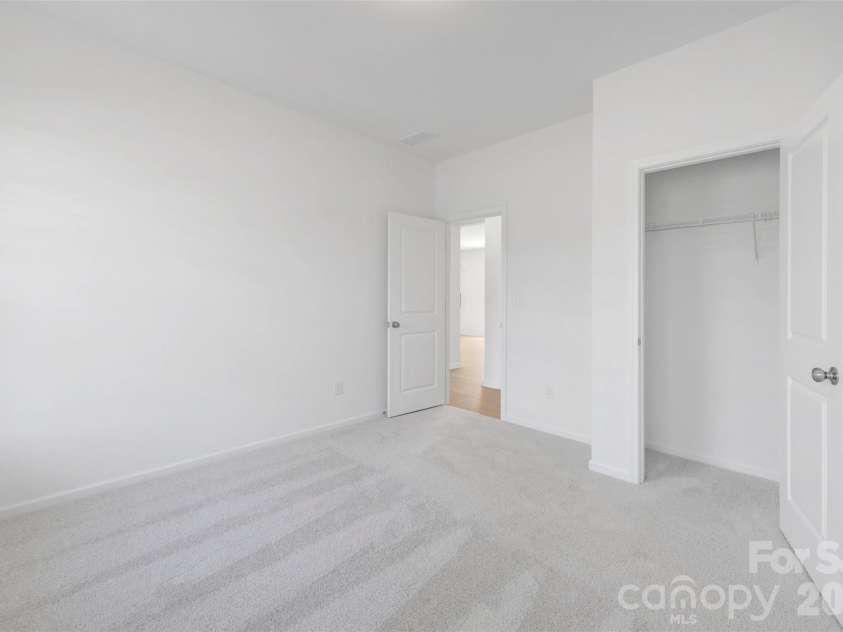 645 Willoughby Park Drive, Monroe, NC 28112.  MLS# CAR4376577, YatesRealty ID 24240. First floor bedroom