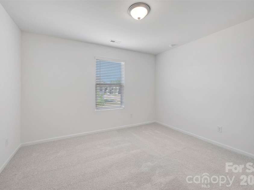 645 Willoughby Park Drive, Monroe, NC 28112.  MLS# CAR4376577, YatesRealty ID 24240. Secondary bedroom