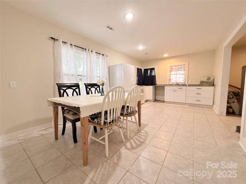 3465 Peniel Road, Tryon, NC 28782.  MLS# CAR4213034, YatesRealty ID 24241. Wide open kitchen if you wanted a larger table or bar/island!