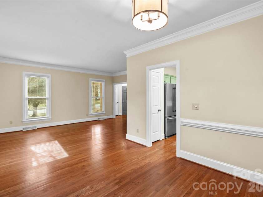 131 Morrison Hill Road, Davidson, NC 28036.  MLS# CAR4347285, YatesRealty ID 24245. Dining room is open to formal living room making for easy entertaining space.