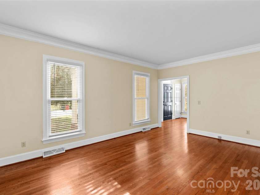 131 Morrison Hill Road, Davidson, NC 28036.  MLS# CAR4347285, YatesRealty ID 24245. Formal living room has wonderful natural light.