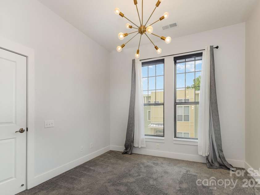 3271 Noda Boulevard, Charlotte, NC 28205.  MLS# CAR4267285, YatesRealty ID 24253. Primary bedroom