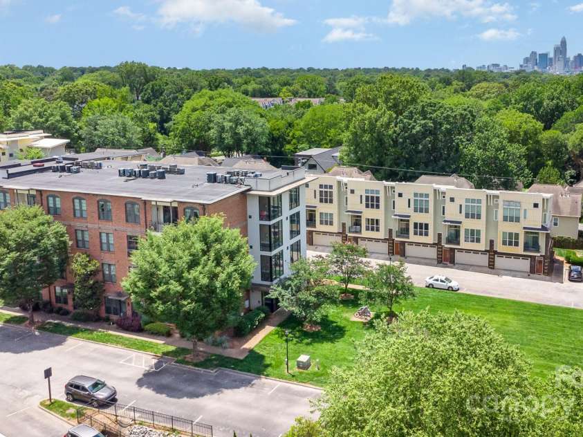 3271 Noda Boulevard, Charlotte, NC 28205.  MLS# CAR4267285, YatesRealty ID 24253. Uptown CLT skyline