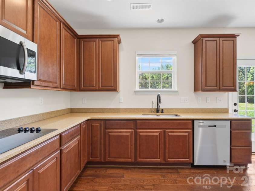 1008 Spring Rose Lane, Matthews, NC 28104.  MLS# CAR4382906, YatesRealty ID 24258. 