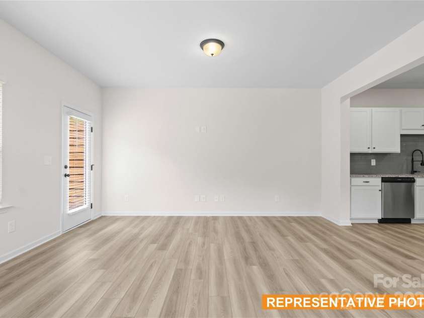 6025 Jasmine Branch Road, Charlotte, NC 28216.  MLS# CAR4278742, YatesRealty ID 24267. Suwanee Family Room