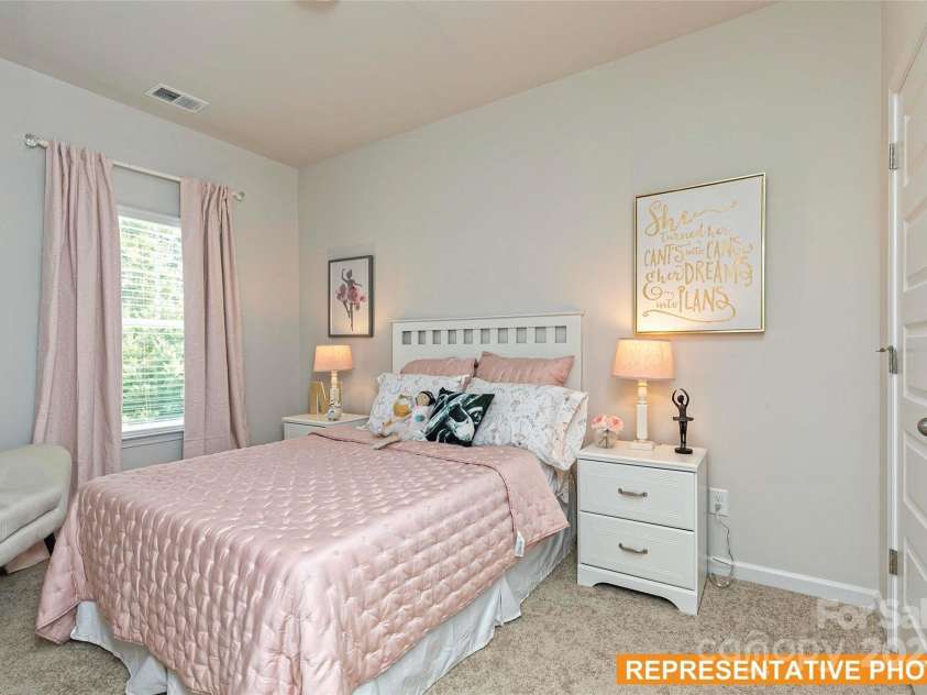 6025 Jasmine Branch Road, Charlotte, NC 28216.  MLS# CAR4278742, YatesRealty ID 24267. Suwanee Secondary Bedroom 1