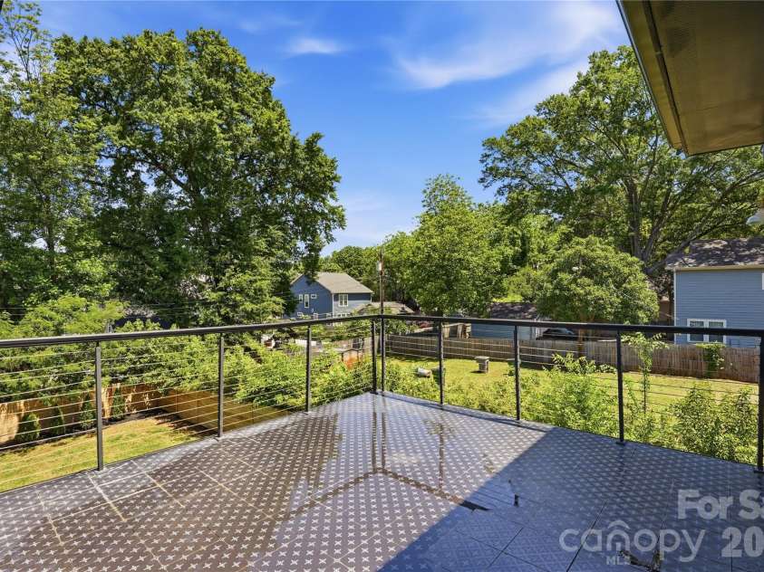 1109 Leigh Avenue, Charlotte, NC 28205.  MLS# CAR4430239, YatesRealty ID 24272. Outdoor Rooftop Patio Overlooking Private Backyard