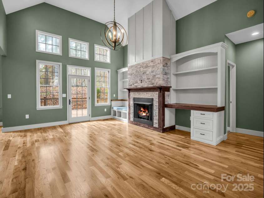 351 Rambling Creek, Tryon, NC 28782.  MLS# CAR4327105, YatesRealty ID 24276. Beautiful fireplace and built-ins in the Great Room
