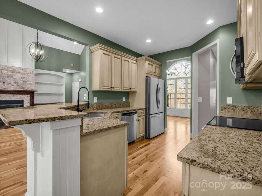 351 Rambling Creek, Tryon, NC 28782.  MLS# CAR4327105, YatesRealty ID 24276. Spacious Kitchen with Breakfast Bar