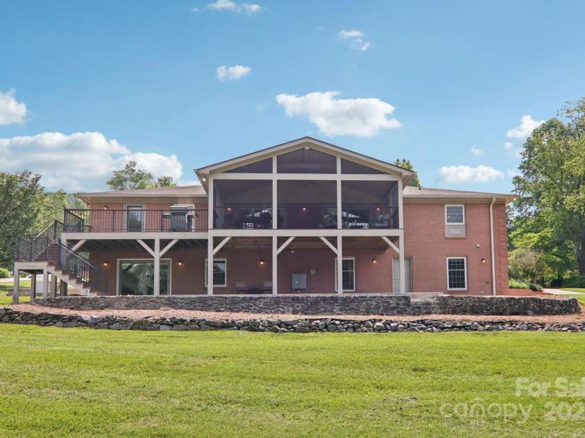 119 Hawthorn Drive, Hendersonville, NC 28791.  MLS# CAR4260903, YatesRealty ID 24278. Back of house