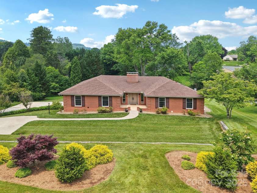 119 Hawthorn Drive, Hendersonville, NC 28791.  MLS# CAR4260903, YatesRealty ID 24278. Front View