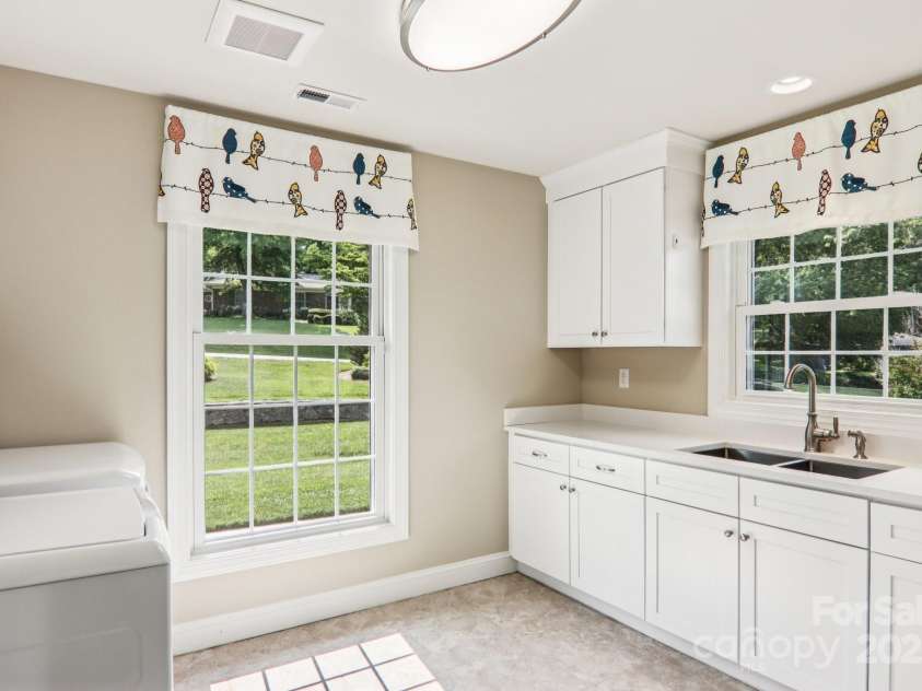 119 Hawthorn Drive, Hendersonville, NC 28791.  MLS# CAR4260903, YatesRealty ID 24278. Laundry Room
