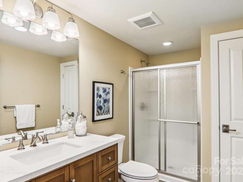 119 Hawthorn Drive, Hendersonville, NC 28791.  MLS# CAR4260903, YatesRealty ID 24278. Lower level Bathroom