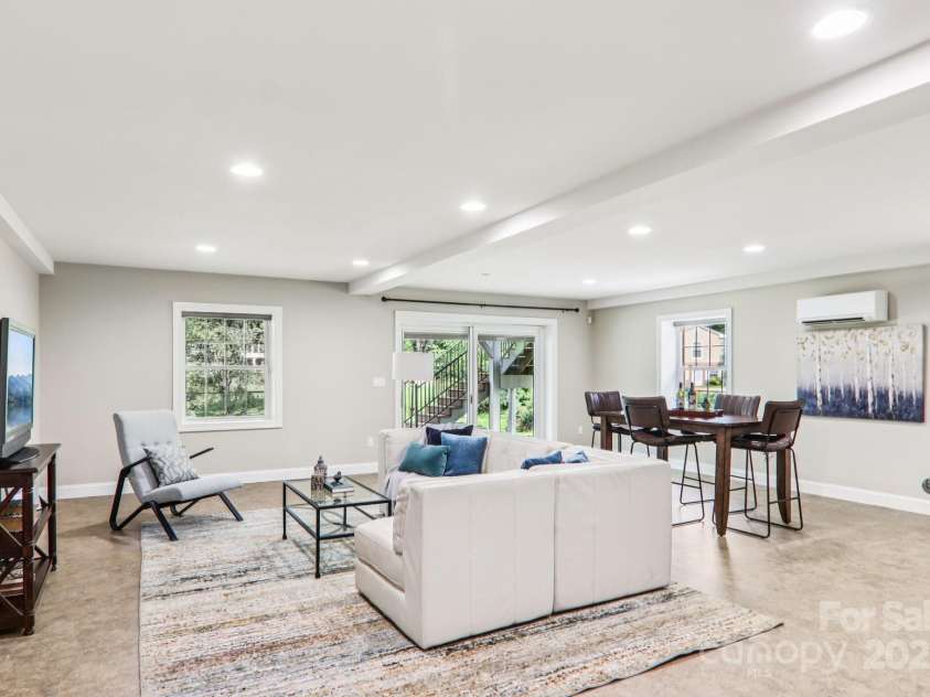 119 Hawthorn Drive, Hendersonville, NC 28791.  MLS# CAR4260903, YatesRealty ID 24278. Lower level Flex space