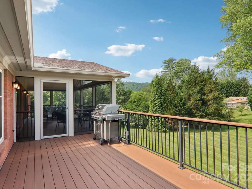 119 Hawthorn Drive, Hendersonville, NC 28791.  MLS# CAR4260903, YatesRealty ID 24278. Open deck for grilling