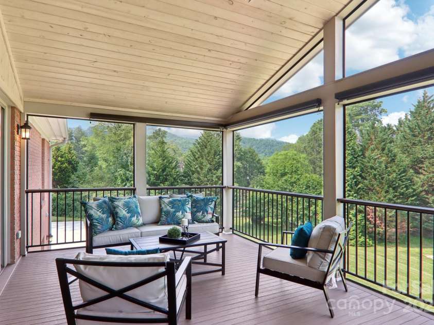 119 Hawthorn Drive, Hendersonville, NC 28791.  MLS# CAR4260903, YatesRealty ID 24278. Screened Porch
