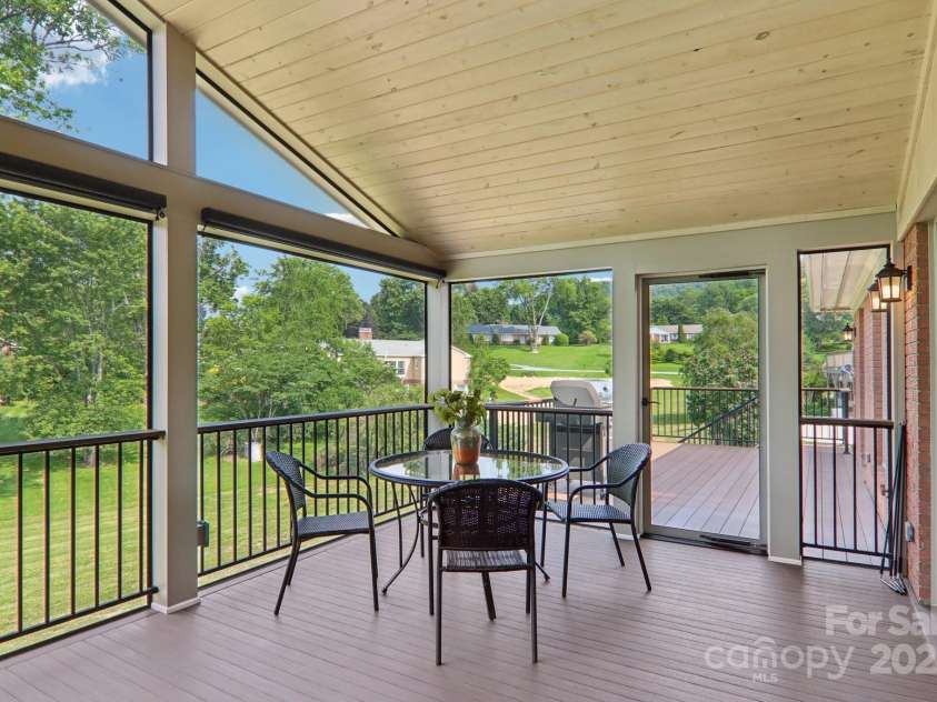 119 Hawthorn Drive, Hendersonville, NC 28791.  MLS# CAR4260903, YatesRealty ID 24278. Screened Porch