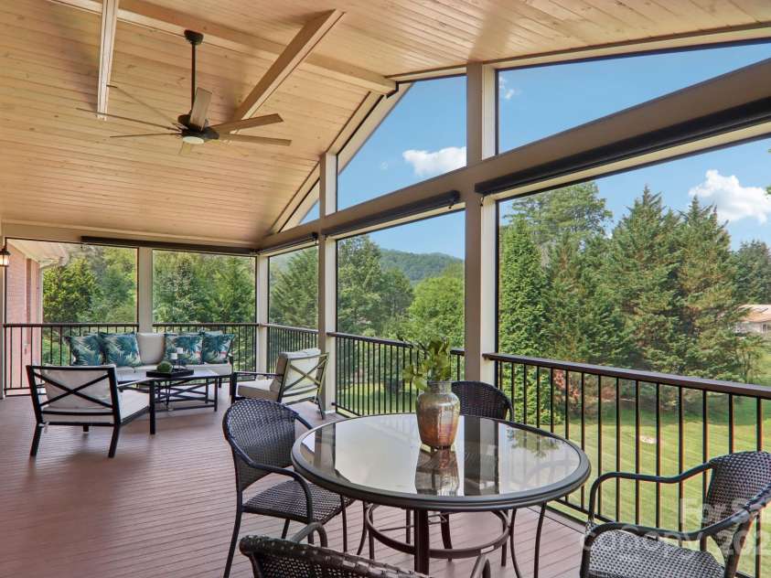 119 Hawthorn Drive, Hendersonville, NC 28791.  MLS# CAR4260903, YatesRealty ID 24278. Screened Porch
