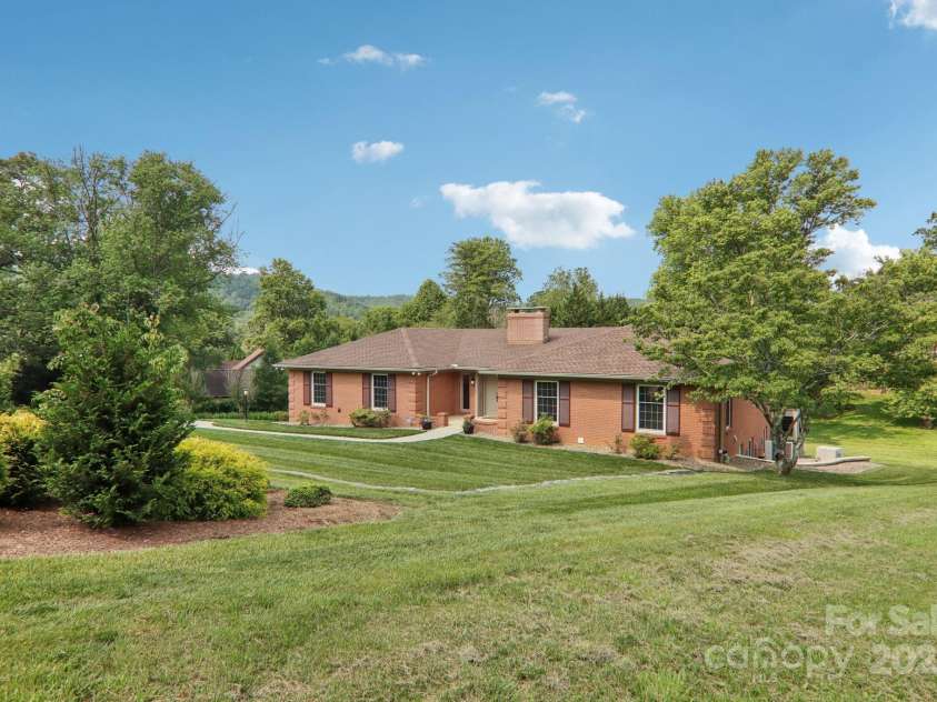 119 Hawthorn Drive, Hendersonville, NC 28791.  MLS# CAR4260903, YatesRealty ID 24278. Side view