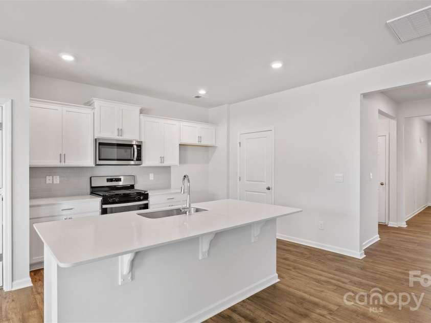 119 Bovine Branch Road, Fletcher, NC 28732.  MLS# CAR4286896, YatesRealty ID 2428. Photos are representative