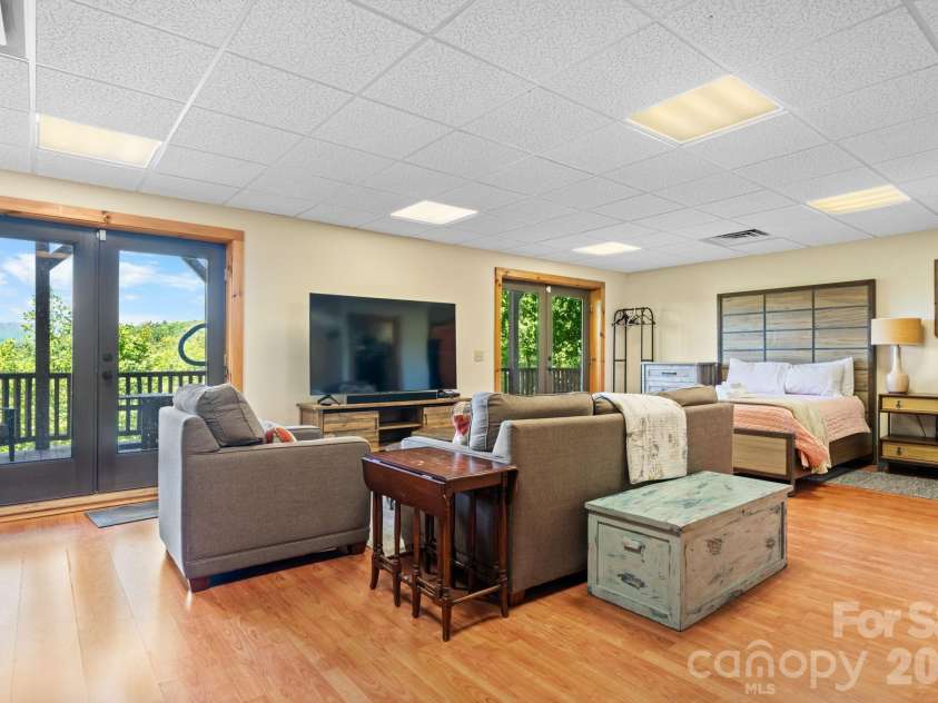 6749 Fire Crest Lane, Lenoir, NC 28645.  MLS# CAR4377295, YatesRealty ID 24281. Basement Entertaining Space - Also Used As 4th Bedroom