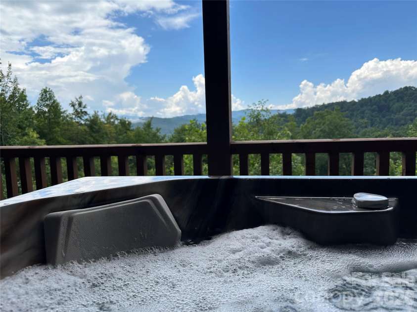 6749 Fire Crest Lane, Lenoir, NC 28645.  MLS# CAR4377295, YatesRealty ID 24281. Hot Tub-Basement Level Deck