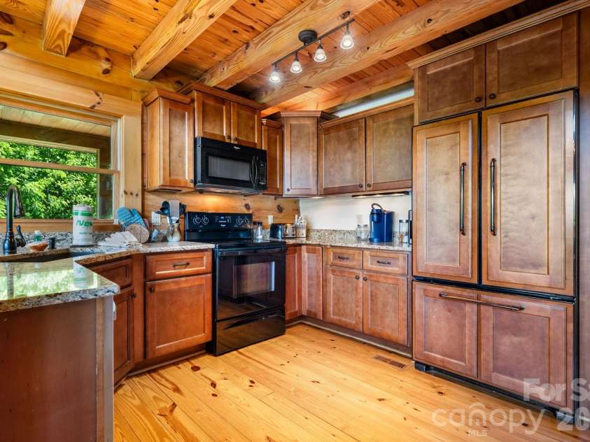6749 Fire Crest Lane, Lenoir, NC 28645.  MLS# CAR4377295, YatesRealty ID 24281. Main Level Kitchen